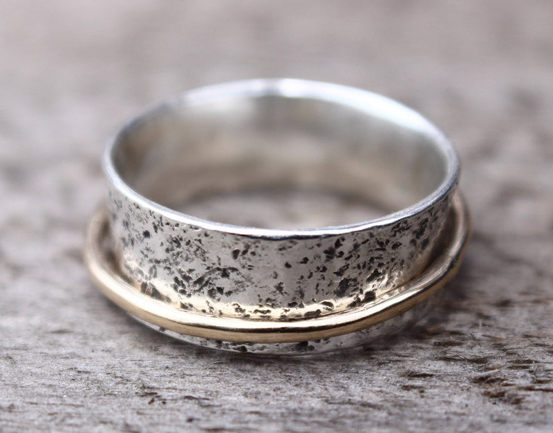 Silver and gold spinner ring top